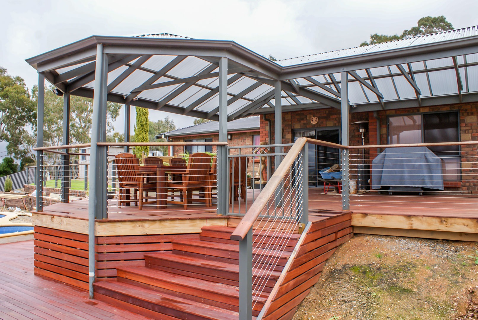 Raised timber verandah with metal balustrades